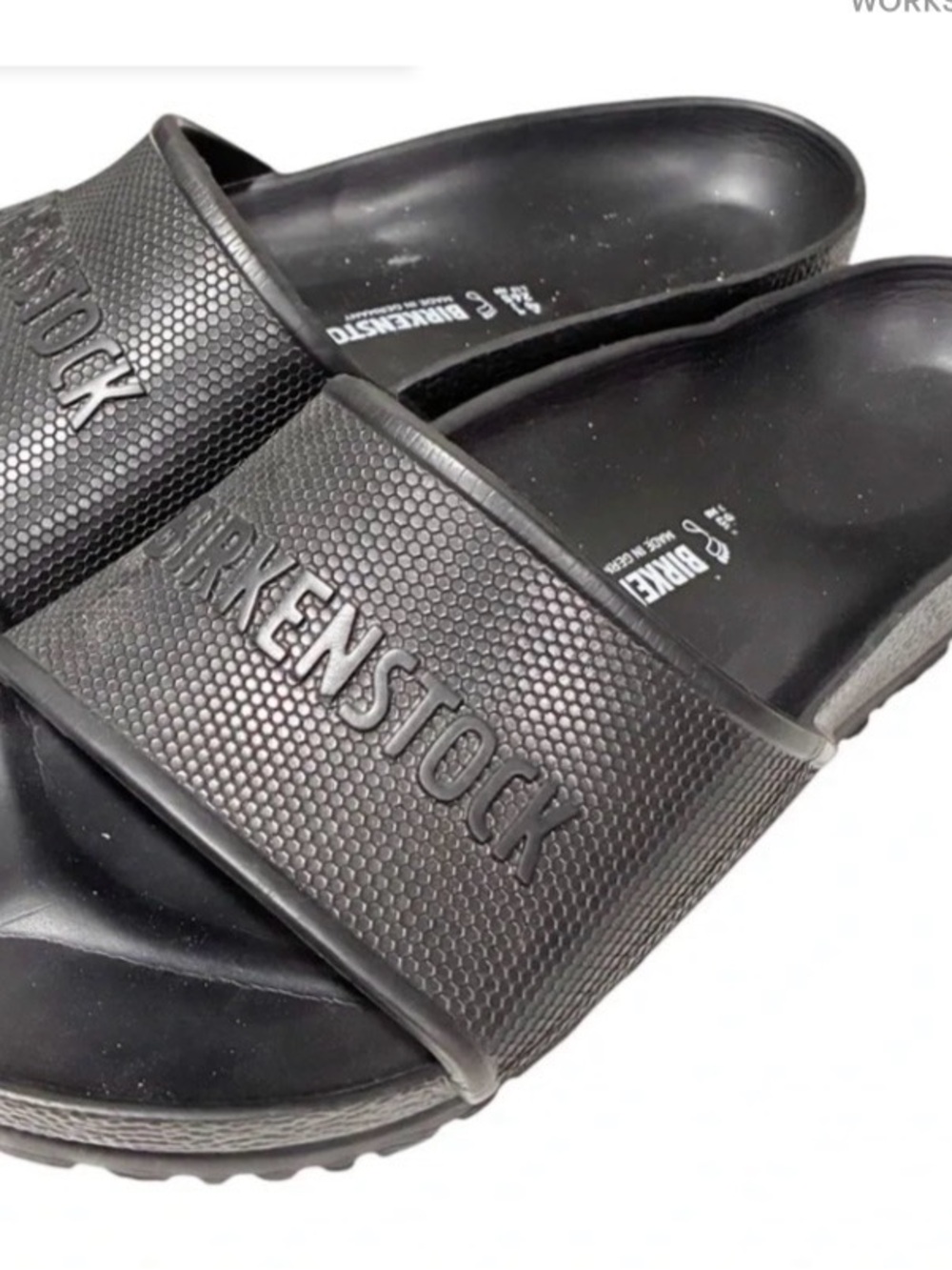 Birkenstock Unisex Black Slide Sandals with Embossed Logo